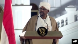 Sudan's President Omar al-Bashir speaks at the Presidential Palace, Feb. 22, 2019, in Khartoum, Sudan