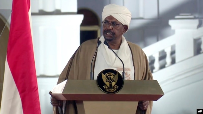 FILE - Sudan's President Omar al-Bashir speaks at the Presidential Palace in Khartoum, Sudan, Feb. 22, 2019.