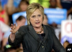 Democratic presidential candidate Hillary Clinton gestures as she speaks during a rally in Raleigh, N.C.
