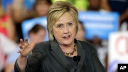 Democratic presidential candidate Hillary Clinton gestures as she speaks during a rally in Raleigh, N.C.