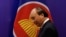 FILE - Vietnam's Prime Minister Nguyen Xuan Phuc walks past the ASEAN flag as he attends an event as part of the 37th ASEAN Summit in Hanoi, Vietnam, Nov. 15, 2020. 