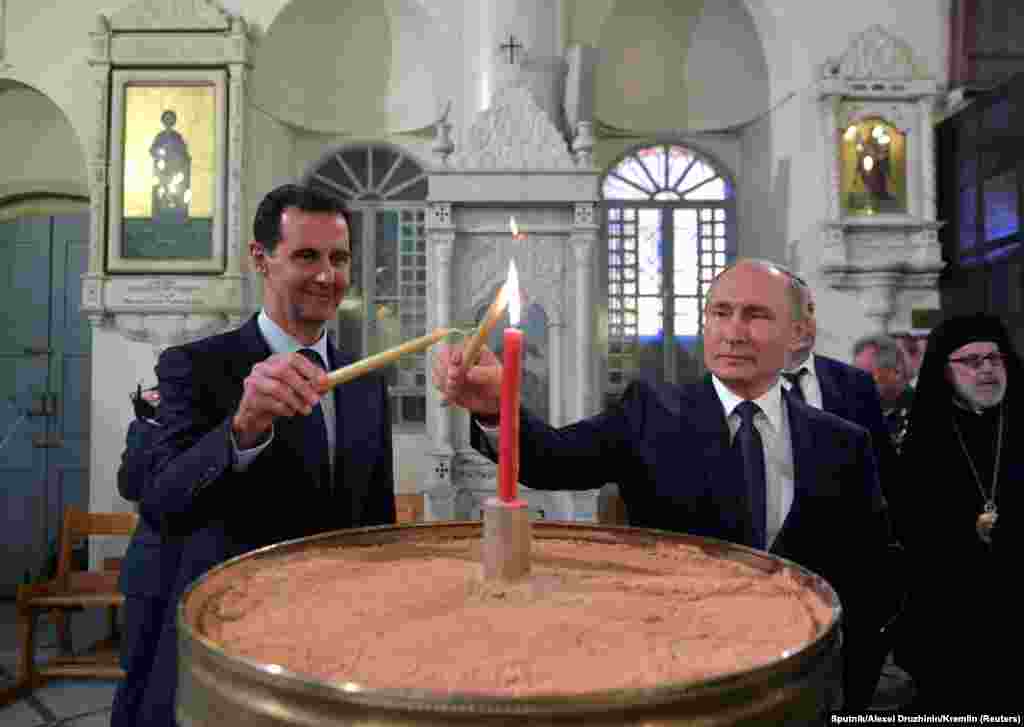 Rossiya Prezidenti Vladimir Putin va Suriya rahbari Bashar al-Asad ibodatxonada. Damashq, Suriya.&nbsp;