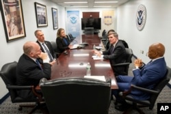 U.S. President Donald Trump's border czar, Thomas Homan, left, and New York Mayor Eric Adams, right, meet in New York on Feb. 13, 2025. (Office of the Mayor of New York via AP)