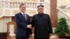 South Korean President Moon Jae-in shakes hands with North Korean leader Kim Jong Un as they arrive for their meeting at the headquarters of the Central Committee of the Workers' Party of Korea in Pyongyang, North Korea, September 18, 2018.