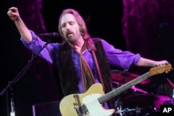 FILE - Tom Petty and the Heartbreakers performs at The Hangout Festival on May 18, 2013.