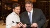 Ukraine's President-elect Volodymyr Zelenskiy, left, meets with Lithuania's Foreign Minister Linas Linkevicius in Kyiv, Ukraine, April 25, 2019.