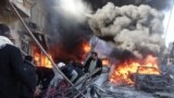 Medical personnel look for survivors following a reported airstrike on the Tariq al-Bab district of the northern Syrian city of Aleppo. 