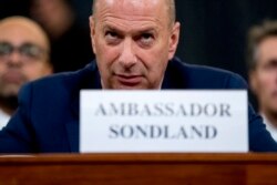 FILE - Gordon Sondland, U.S. ambassador to the EU, appears before the House Intelligence Committee on Capitol Hill, Nov. 20, 2019, during an impeachment hearing into President Donald Trump's actions.