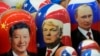 FILE - Traditional Russian wooden dolls depicting China's President Xi Jinping, U.S. President-elect Donald Trump and Russian President Vladimir Putin are displayed for sale at a souvenir shop in St. Petersburg, Russia, Nov. 21, 2024. 