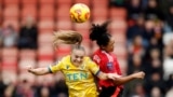 Crystal Palace&#39;s Lily Woodham and Manchester United&#39;s Jayde Riviere fight for the ball during the Women&#39;s Super League football match between Manchester United and Crystal Palace at Leigh Sports Village in Leigh, Britain.