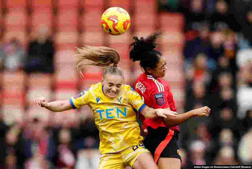 Crystal Palace&#39;s Lily Woodham and Manchester United&#39;s Jayde Riviere fight for the ball during the Women&#39;s Super League football match between Manchester United and Crystal Palace at Leigh Sports Village in Leigh, Britain.