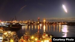 A huge fireball is seen streaking across the sky above Portsmouth, N.H., early Tuesday morning. (portsmouthwebcam.com)