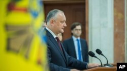 Moldova's President Igor Dodonin delivers a brief statement after a meeting of the country's Supreme Security Council in Chisinau, Moldova, June 11, 2019. 