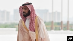 FILE - Saudi Arabia Deputy Crown Prince Mohammed bin Salman arrives in Hangzhou, China to participate in the G20 Summit, Sept. 4, 2016.