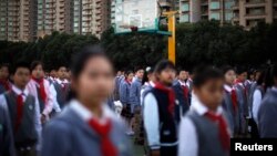 Des élèves à Shanghai, le 5 novembre 2012. (REUTERS/Carlos Barria)