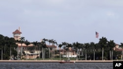 FILE - A Coast Guard boat patrols Mar-a-Largo near President Donald Trump's Mar-a-Largo club in Palm Beach, Fla., Dec. 26, 2019. 