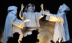 FILE - Actors perform during a dress rehearsal of Guiseppe Verdi's opera "Macbeth" in Salzburg, July 28, 2011, in preparation for the 91st edition of the Salzburg Festival.