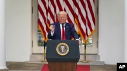 Presiden Donald Trump dalam konferensi pers di Rose Garden, Gedung Putih, 26 Mei 2020. (Foto: AP)