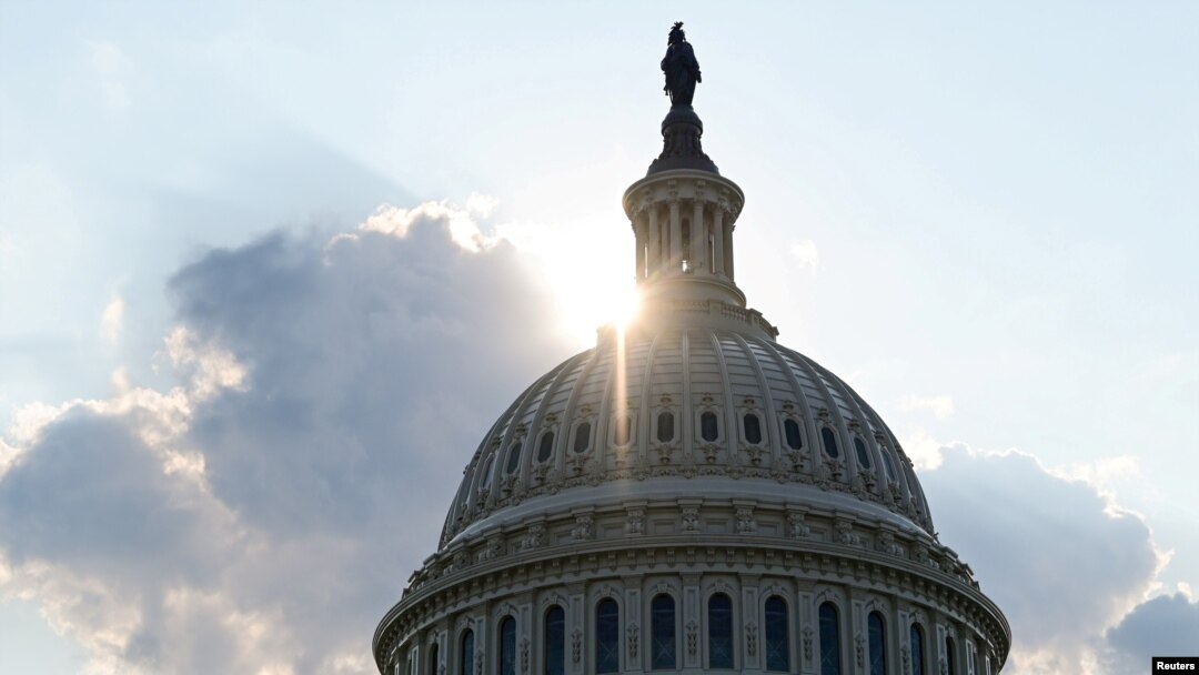 FILE - The dome of the U.S. Capitol Building is seen as the sun sets on Capitol Hill in Washington, July 26, 2019. 
