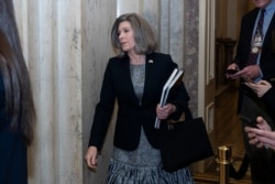 Senator Joni Ernst (R-Iowa) walks on Capitol Hill, February 3, 2020, in Washington.