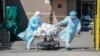 2020年4月6日纽约布鲁克林区威克夫医院因冠状病毒死亡者被运送到一台用作临时停尸房的冷藏车上。
