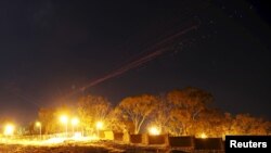 The sky over Sana'a is illuminated by anti-aircraft fire during a Saudi-led airstrike in Yemen's capital, Sana'a, Sept. 26, 2015. 