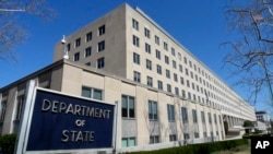 FILE - The Harry S. Truman Building, headquarters for the State Department, is seen in Washington, March 9, 2009.