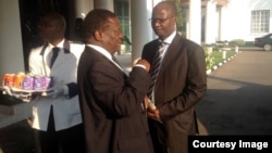 New Justice Minister Emmerson Mnangagwa and Information Minister Jonathan Moyo