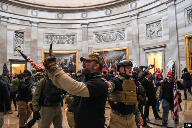 Supporters of US President Donald Trump enter the US Capitol's Rotunda on January 6, 2021