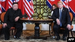 FILE - U.S. President Donald Trump and North Korea's leader Kim Jong Un meet during the second U.S.-North Korea summit at the Sofitel Legend Metropole hotel in Hanoi, Feb. 28, 2019.