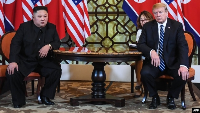 FILE - U.S. President Donald Trump and North Korea's leader Kim Jong Un meet during the second U.S.-North Korea summit at the Sofitel Legend Metropole hotel in Hanoi, Feb. 28, 2019.