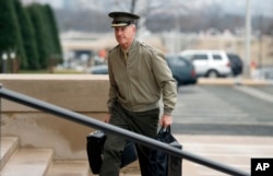 Chairman of the Joint Chiefs Gen. Joseph Dunford arrives at the Pentagon, Jan. 21, 2017 in Washington.