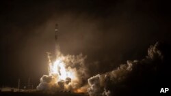 The SpaceX Falcon 9 rocket launches with the Double Asteroid Redirection Test, or DART, spacecraft onboard, Nov. 23, 2021, from Space Launch Complex 4E at Vandenberg Space Force Base in California.