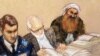 A sketch by a courtroom artist shows self-proclaimed terrorist mastermind Khalid Sheikh Mohammed, right, as he reviews court documents with his lawyers during the pre-trial hearing at the Guantanamo Bay U.S. Naval Base in Cuba, Feb. 12, 2013.