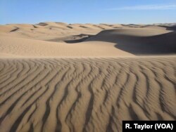 The Imperial Sand Dunes grace a stretch of the 127 kilometers that separate San Luis, Ariz., and Calexico, Calif.