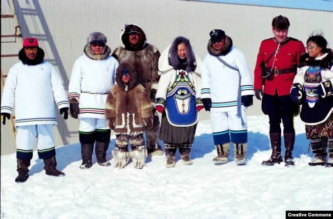 A group of Inuit in traditional dress pose during a ceremony on the occasion of the foundation of Nunavut, the homeland of the Inuit people of northern Canada, April 1, 1999.