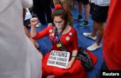 A supporter of former Democratic Presidential candidate Senator Bernie Sanders sits in the the media center after walking out of the convention in protest after Hillary Clinton was nominated during the Democratic National Convention in Philadelphia.
