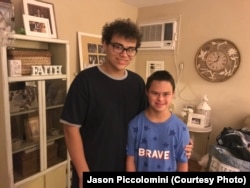 Jason Piccolomini, left, and his brother Brandon, right, at their home in Staten Island, NY. Jason leaves for his first-year of college this weekend.