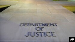 FILE - The Department of Justice headquarters in Washington.