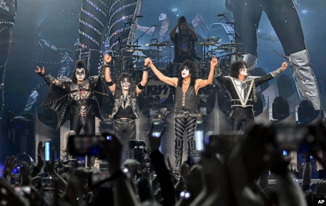 Gene Simmons, left, Eric Singer, Paul Stanley and Tommy Thayer of KISS take a bow during the final night of the "Kiss Farewell Tour," Saturday, Dec. 2, 2023, at Madison Square Garden in New York. (Photo by Evan Agostini/Invision/AP)