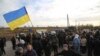 Kyiv Starts Troop Withdrawal From Eastern Ukraine Town