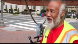 中国农民骑三轮车周游世界抵华盛顿