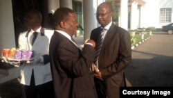 FILE: Former Justice Minister Emmerson Mnangagwa and Information Minister Jonathan Moyo at State House in 2016