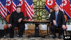 FILE - U.S. President Donald Trump and North Korea's leader Kim Jong Un meet during the second U.S.-North Korea summit at the Sofitel Legend Metropole hotel in Hanoi, Feb. 28, 2019.