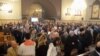 FILE - Armenian Orthodox worshippers attend a Christmas service at the Holy Mother of God Armenian Orthodox Church on Jan. 6, 2016 in the northern Syrian city of Aleppo. 