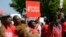 Protesters march in support of the girls kidnapped by members of Boko Haram in front of the Nigerian Embassy in Washington on May 6, 2014. 