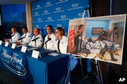 A photo of an unidentified patient whose lungs were damaged beyond repair from vaping is displayed during news conference with medical staff at Henry Ford Hospital in Detroit, Nov. 12, 2019.