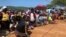Machongwe villagers from Chimanimani district wait for food relief, March 26, 2019.