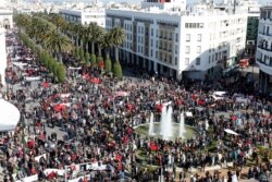 FILE - Protesters chant slogans at a rally in Rabat, Morocco, as they accuse the U.N. Secretary-General of "abandoning neutrality, objectivity and impartiality" during a recent visit, March 13, 2016.