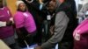 Archbishop Emeritus Desmond Tutu casts his vote during the local government elections in Milnerton, Cape Town, South Africa, Aug. 3, 2016.